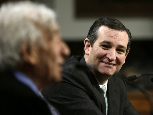 U.S. Sen. Ted Cruz (R-Tex.) listens to Nobel Peace Laureate Elie Wiesel at a roundtable discussion. Cruz said the nuclear talks with Iran were reminiscent of Western appeasement of Hitler. (How original - Not) 