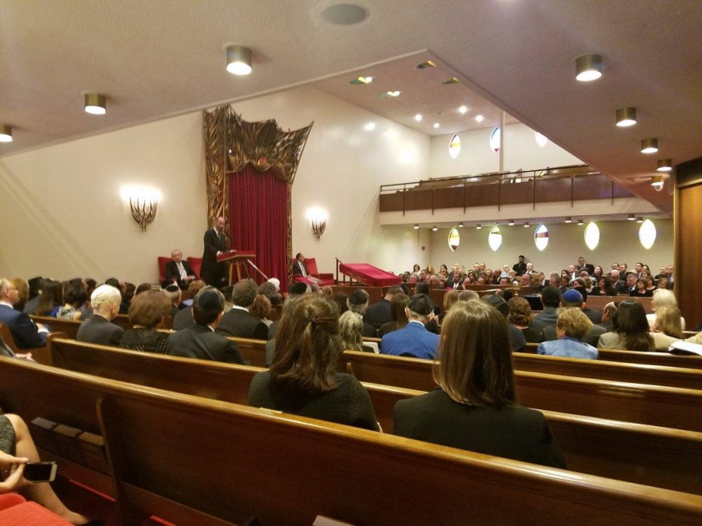 A small gathering of about 150 family and friends listening to eulogies for Elie Wiesel's life.